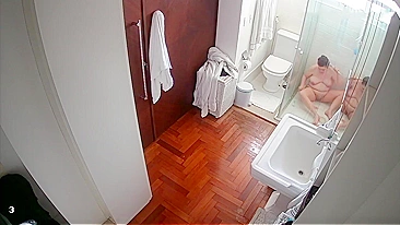 Hidden Cam Caught - Wife showers, shaves and masturbate with a shower head a little.