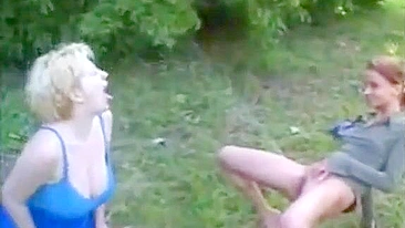 Lewd mother gets pissed on by teen daughter, public outdoor!