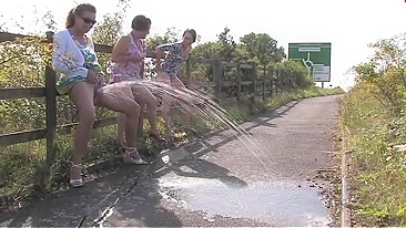 Three British drunk mature sluts and one big fountain of piss play a game of who can go piss the most