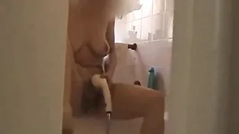 Spy, masturbation in the shower, mom self-satisfied using a shower head and a jet of water Spy, masturbation in the shower, mom self-satisfied using a shower head and a jet of water
