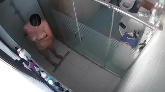 I'm sneaking a peek of my buddy's wifey taking a shower!