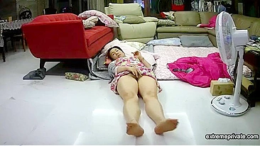 Spy Camera Catches, Asian mother fingering on floor!