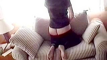 Bitches wife masturbating on a couch gets caught on a hidden  cam