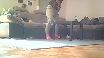 A hidden camera installed by me catches my mom watching porn and masturbating