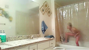 Athletic Sister Caught Pleasuring Herself with Shower Head on Hidden Cam