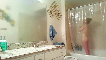 Athletic Sister Caught Pleasuring Herself with Shower Head on Hidden Cam
