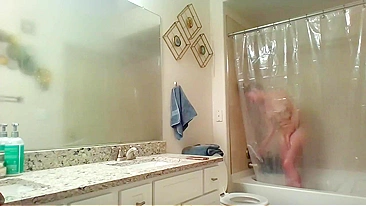 Athletic Sister Caught Pleasuring Herself with Shower Head on Hidden Cam