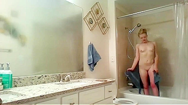 Athletic Sister Caught Pleasuring Herself with Shower Head on Hidden Cam
