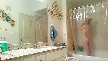Athletic Sister Caught Pleasuring Herself with Shower Head on Hidden Cam