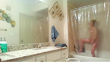 Athletic Sister Caught Pleasuring Herself with Shower Head on Hidden Cam