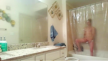 Athletic Sister Caught Pleasuring Herself with Shower Head on Hidden Cam