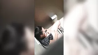 A beautiful lady was filmed with a hidden camera in the toilet with her panties down and fingering