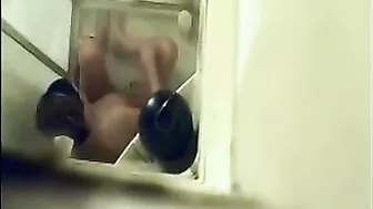 Hidden Cam Catches Horny Mom Jilling Off with Shower Jet on Her Bushy Twat