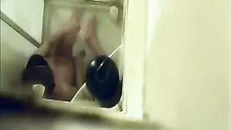 Hidden Cam Catches Horny Mom Jilling Off with Shower Jet on Her Bushy Twat