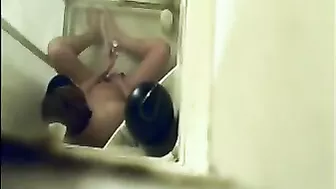Hidden Cam Catches Horny Mom Jilling Off with Shower Jet on Her Bushy Twat