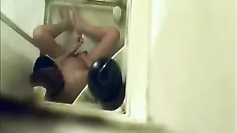 Hidden Cam Catches Horny Mom Jilling Off with Shower Jet on Her Bushy Twat