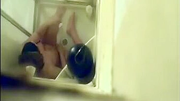 Hidden Cam Catches Horny Mom Jilling Off with Shower Jet on Her Bushy Twat