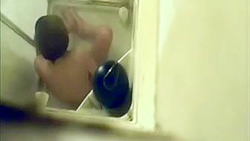 Hidden Cam Catches Horny Mom Jilling Off with Shower Jet on Her Bushy Twat
