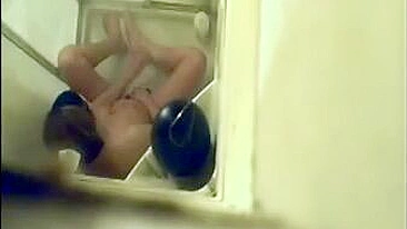 Hidden Cam Catches Horny Mom Jilling Off with Shower Jet on Her Bushy Twat