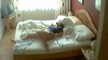 Sneaky Hidden Cam Catches Mother Fingering Herself, Moaning Loudly in Wild Orgasmic Bliss!