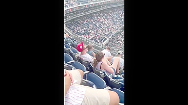 Voyeur Spy Camera Spies Filthy MILF Rubbing Her Soaked Snatch in Packed Baseball Stadium Frenzy