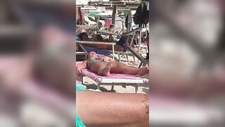 Horny MILF Caught Fingering Her Wet Pussy in Public Beach Crowd - Voyeur Spy Cam!