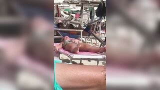 Horny MILF Caught Fingering Her Wet Pussy in Public Beach Crowd - Voyeur Spy Cam!