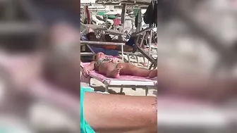 Horny MILF Caught Fingering Her Wet Pussy in Public Beach Crowd - Voyeur Spy Cam!