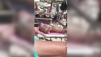 Horny MILF Caught Fingering Her Wet Pussy in Public Beach Crowd - Voyeur Spy Cam!