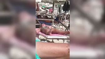 Horny MILF Caught Fingering Her Wet Pussy in Public Beach Crowd - Voyeur Spy Cam!