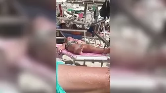 Horny MILF Caught Fingering Her Wet Pussy in Public Beach Crowd - Voyeur Spy Cam!