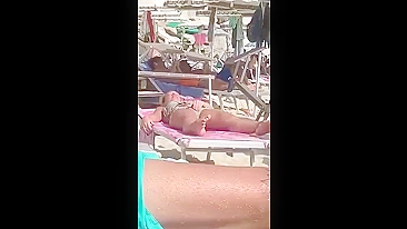 Horny MILF Caught Fingering Her Wet Pussy in Public Beach Crowd - Voyeur Spy Cam!