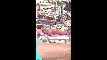 Horny MILF Caught Fingering Her Wet Pussy in Public Beach Crowd - Voyeur Spy Cam!