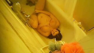 Mom’s Caught Naked & Moaning While Fingering Her Wet Pussy in Mirror Using a Stream of Water