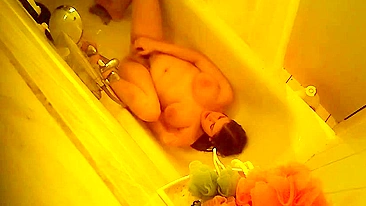 Mom’s Caught Naked & Moaning While Fingering Her Wet Pussy in Mirror Using a Stream of Water