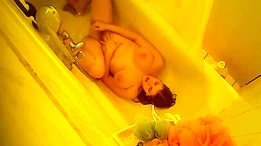 Mom’s Caught Naked & Moaning While Fingering Her Wet Pussy in Mirror Using a Stream of Water