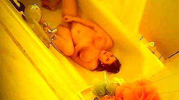 Mom’s Caught Naked & Moaning While Fingering Her Wet Pussy in Mirror Using a Stream of Water