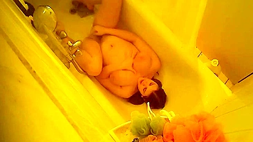 Mom’s Caught Naked & Moaning While Fingering Her Wet Pussy in Mirror Using a Stream of Water