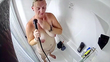 Spy Cam Films Mommy Rubbing Her Furry Snatch to Orgasm in Steamy Bath Time