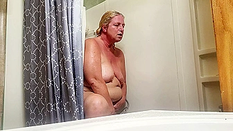 Bitch Mom Jerks Off in Bath with Jet, Tan-Line Tits Bounce as She Cums