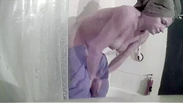 Horny Son Sneaks Cam on Stepmom's Wet Pussy Play in the Shower