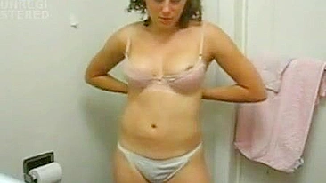 Curly Haired White Siter Strips Nude in Bathroom Tease