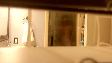 Clever Son Sets Up Hidden Cam to Perv on Mom's Naked Curves in Shower, Jerking to Cunt